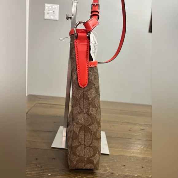 Coach Signature File Crossbody Bag with Bright Orange Trim - Picture 4 of 12